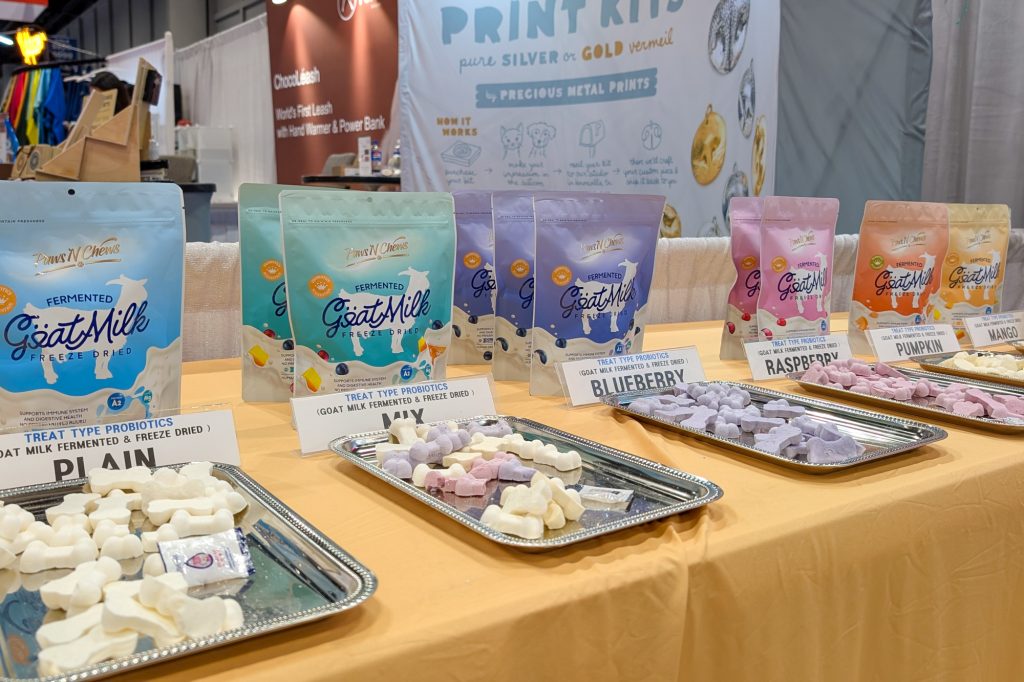 Several flavors of goat milk dog treats on a table